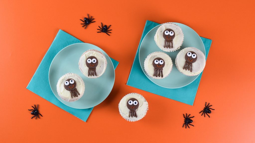 Halloween themed cupcakes decorated with spiders