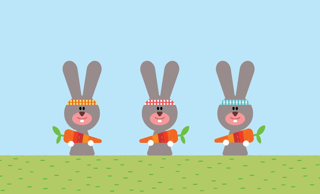 The hippy rabbits catch a handful of carrots