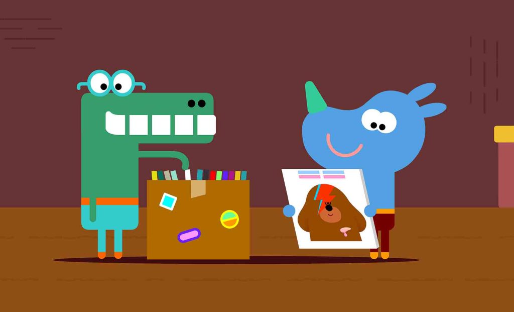 Happy and Tag looking through Duggee’s vinyl collection